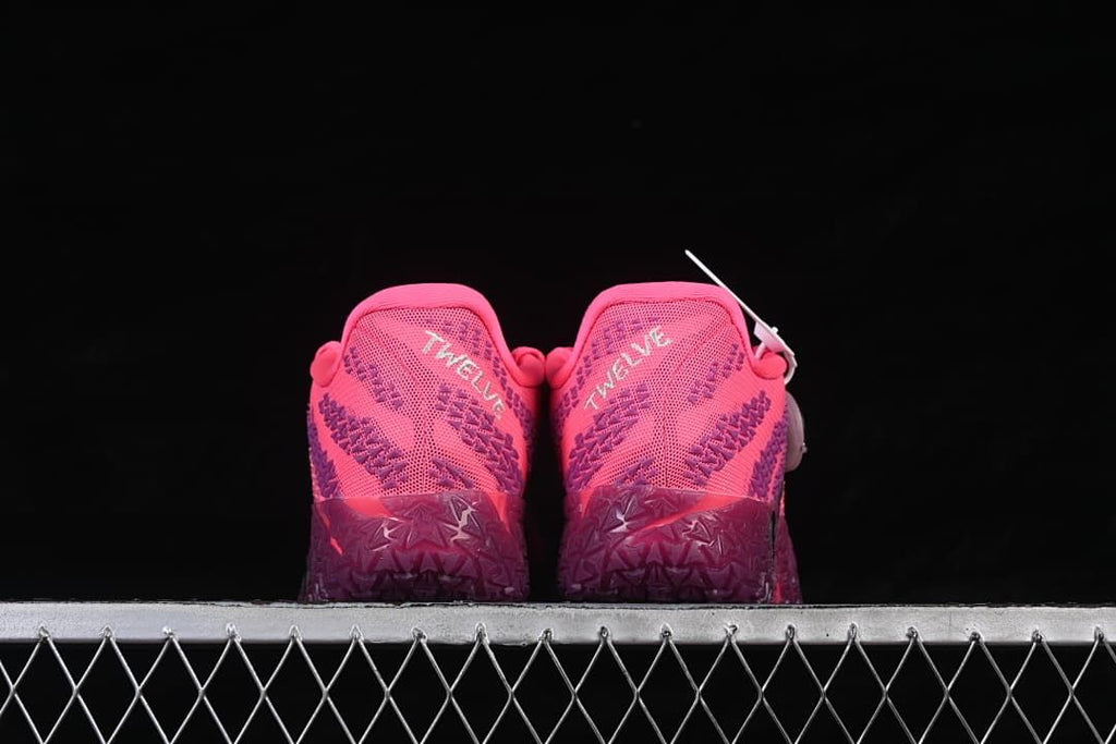 Rear view of the pair showing heel details and patterned outsoles