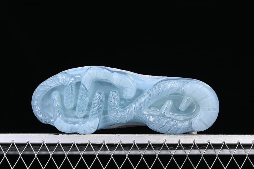 Underside view of the translucent blue sneaker sole