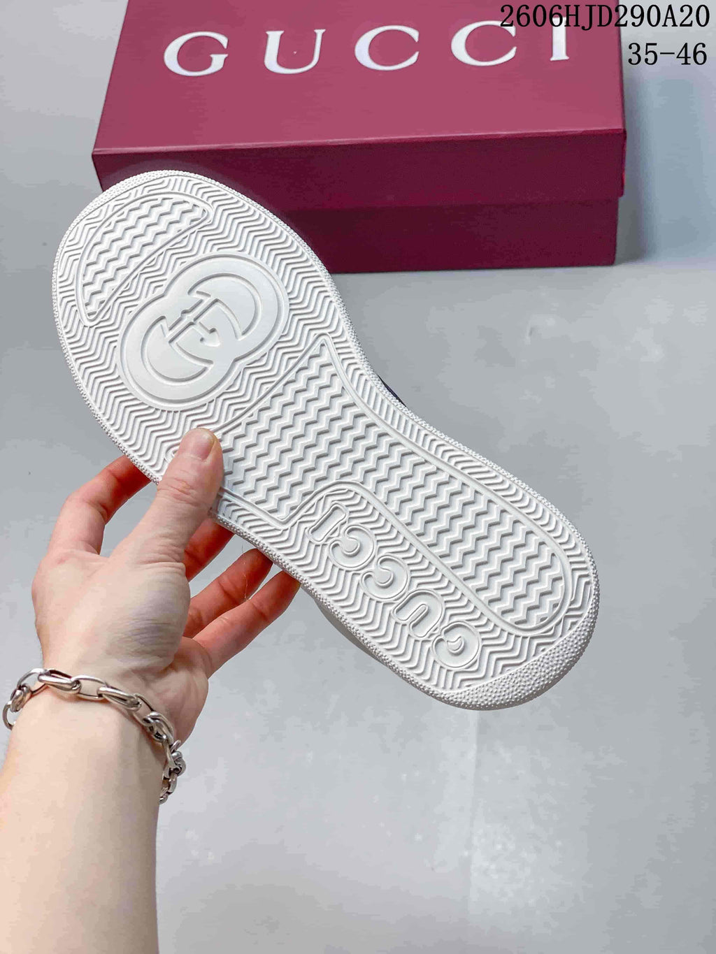 Close-up of the white patterned outsole on a Gucci sneaker