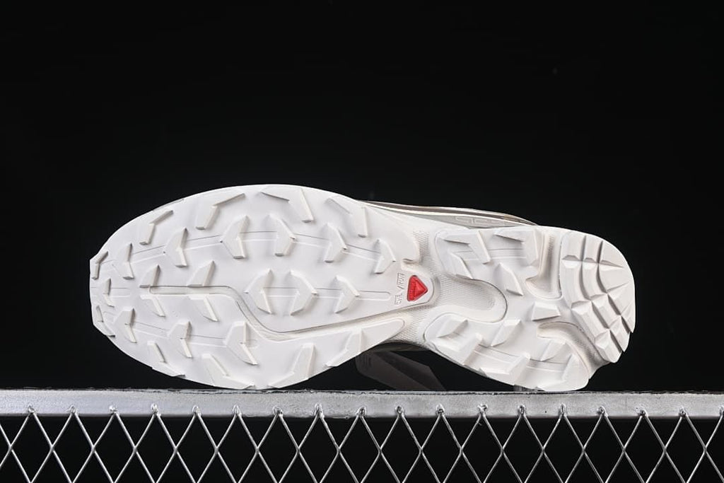 Underside view showing the lugged outsole pattern.