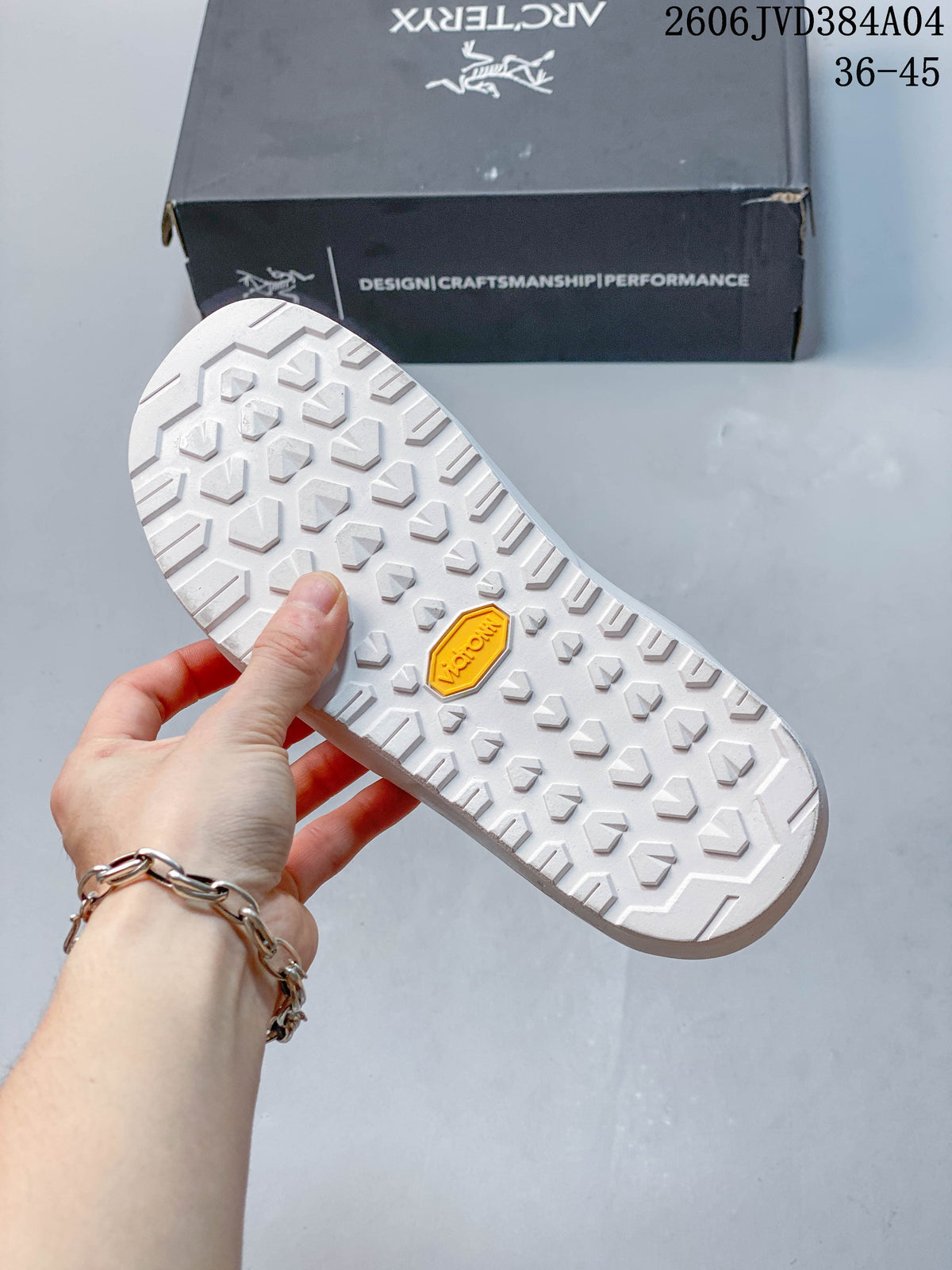 Close-up of the patterned tread on the white shoe sole