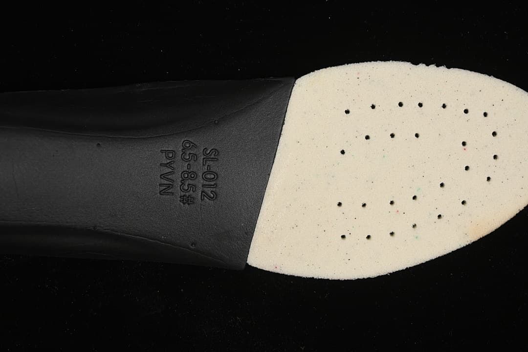 Close-up of the shoe's insole underside with printed size range marking.