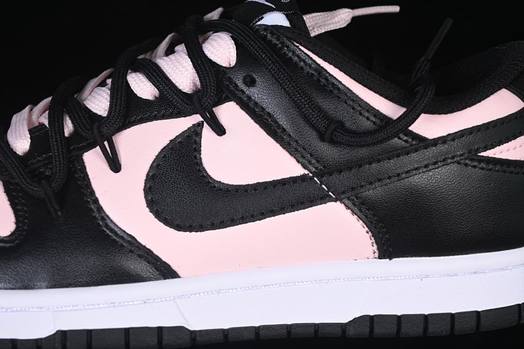 Close-up of the side Swoosh, panels, and contrasting laces