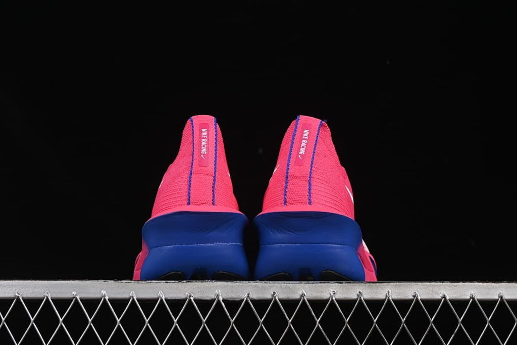 Rear view of the pair showing blue heel midsoles and pink heel counters.