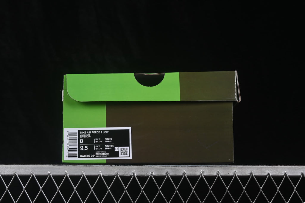 Green Nike shoebox with a product label showing Air Force 1 Low, style code DW8806 024, and photographed size information.