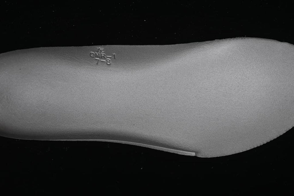 Close-up of the gray footbed underside.