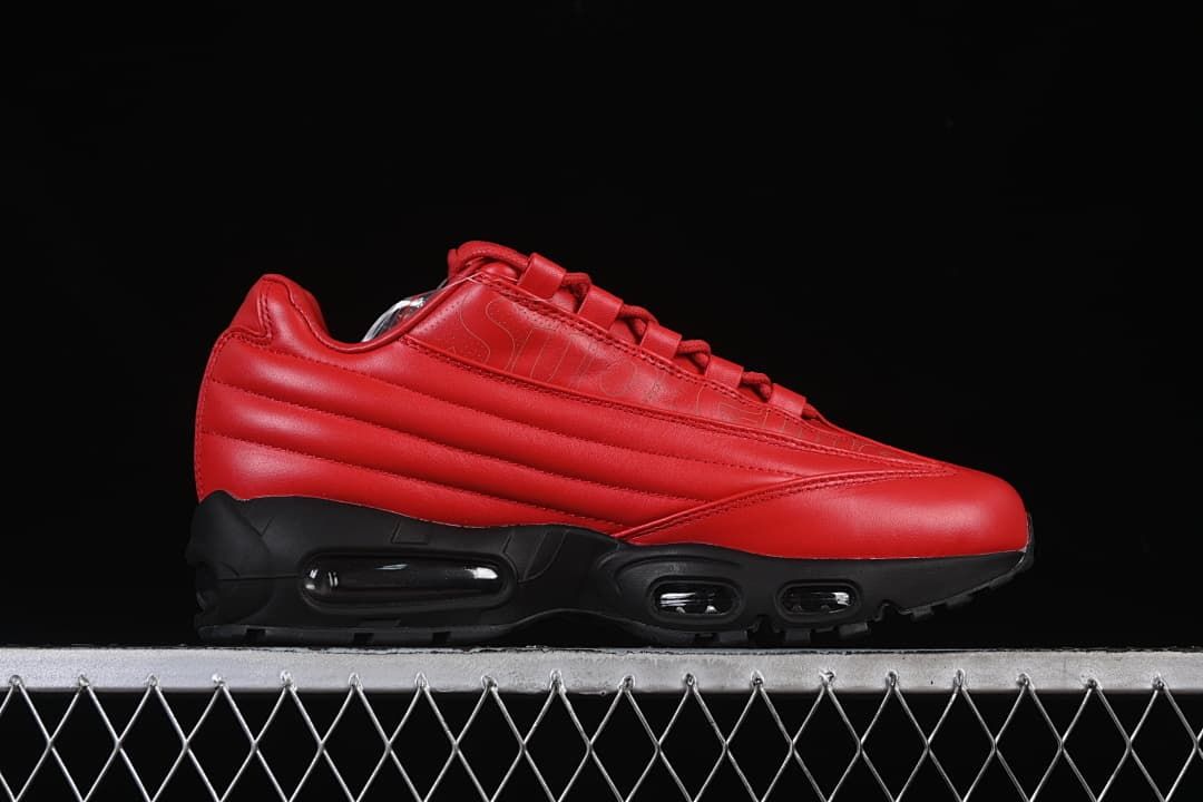 Side profile showing red upper, black sole, and visible air units