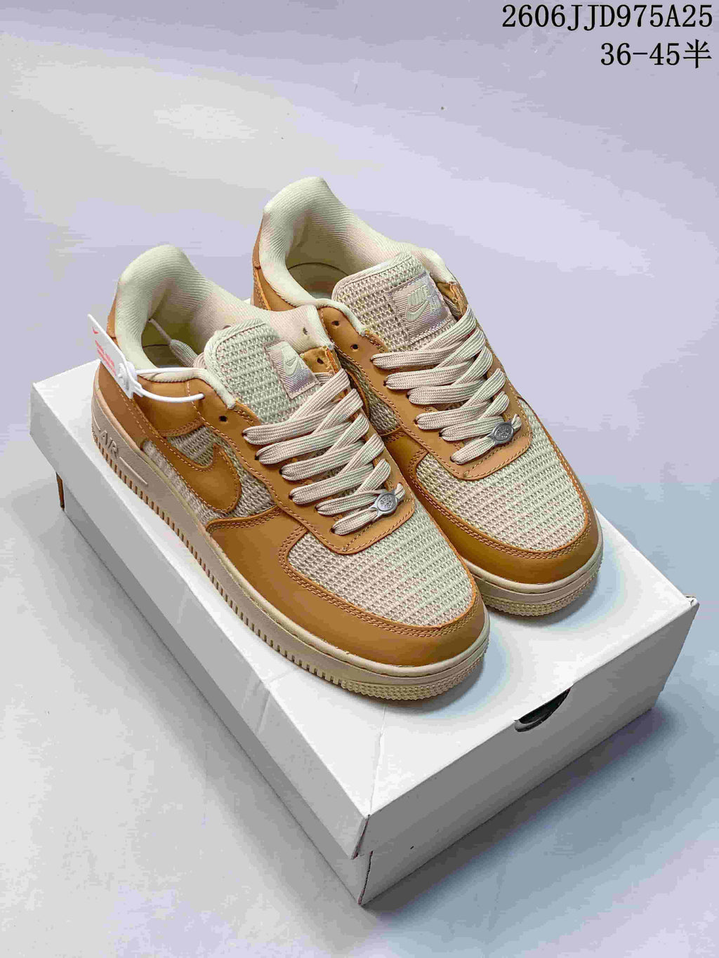 Tan and cream low-top sneakers with woven-look panels and contrasting overlays