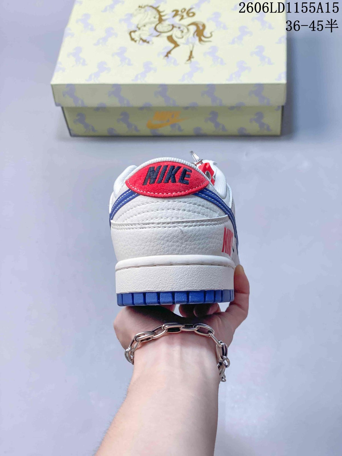 Rear view showing the white heel, red detail and blue outsole