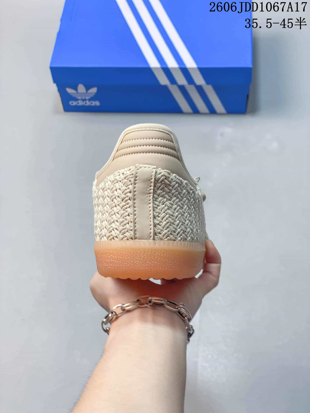 Rear view showing the textured heel and gum-colored sole