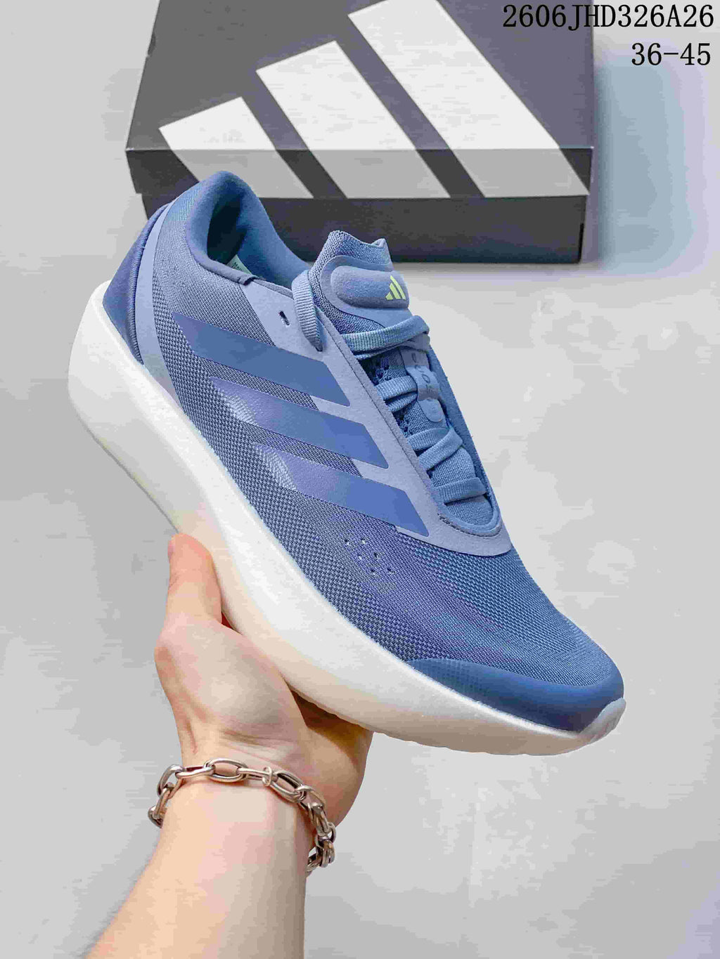 Close view of a blue adidas Supernova Rise 3 shoe with three-stripe side detailing
