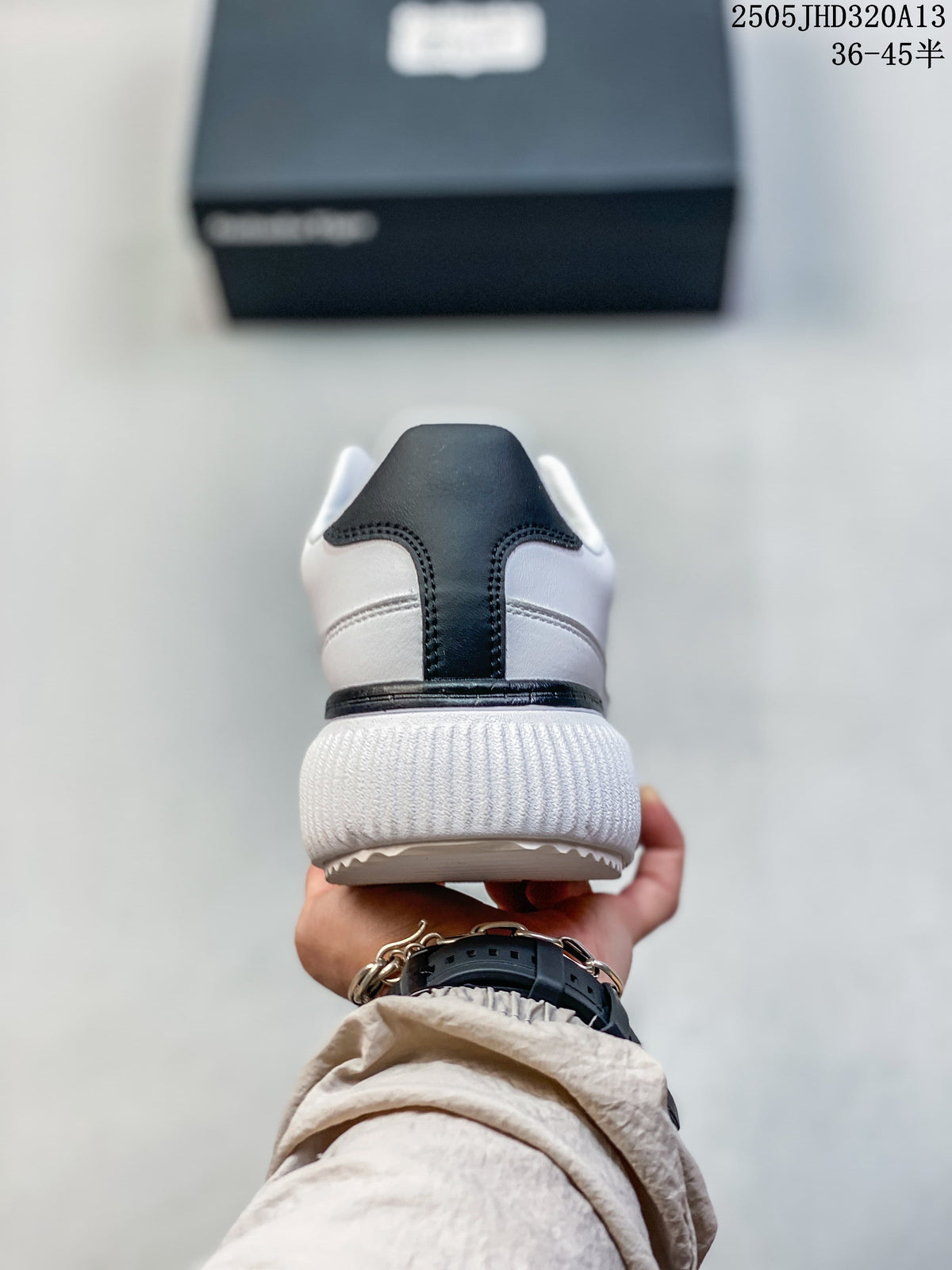 Rear view showing the black heel accent and ribbed white sole.