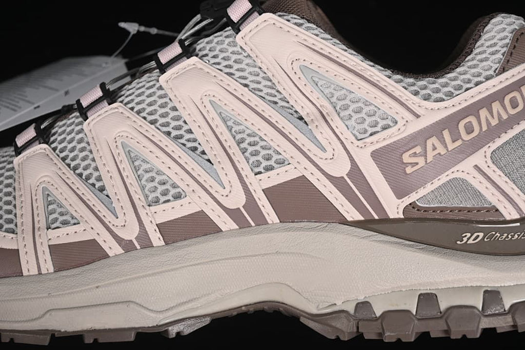 Close-up of the side overlays, mesh-style upper, and outsole