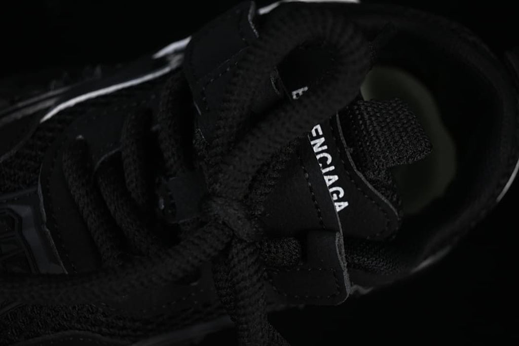 Close-up of the laces, tongue, and hook-and-loop strap.