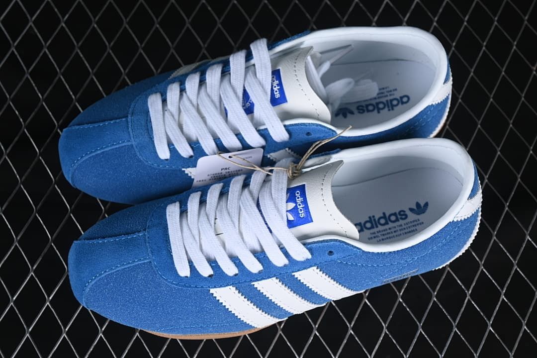 Pair of blue and white Tokyo low-top sneakers viewed from above