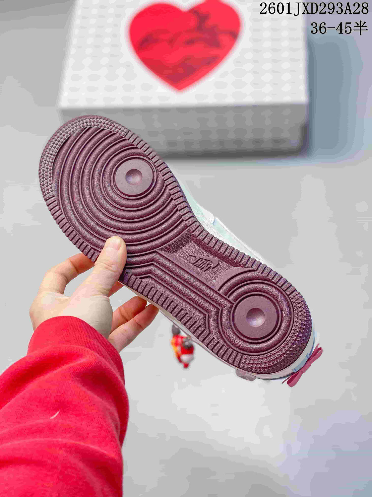 Close-up of the dark mauve patterned outsole