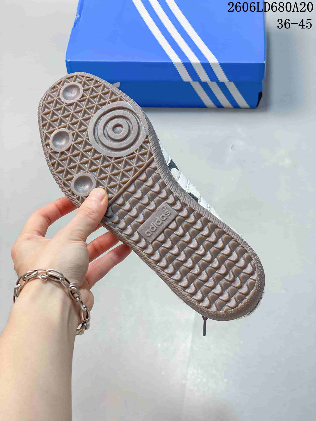 Close-up of the gum-colored outsole with patterned tread