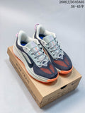 Pair of Nike ACG Pegasus Trail 6 shoes in navy, pale green, light gray, and orange, shown on a Nike Trail box.