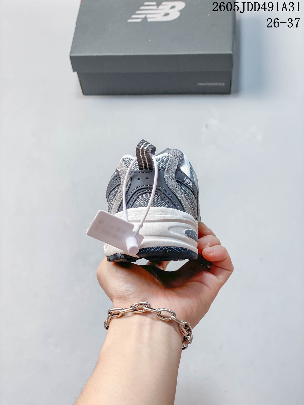 Rear view of a gray New Balance kids' sneaker