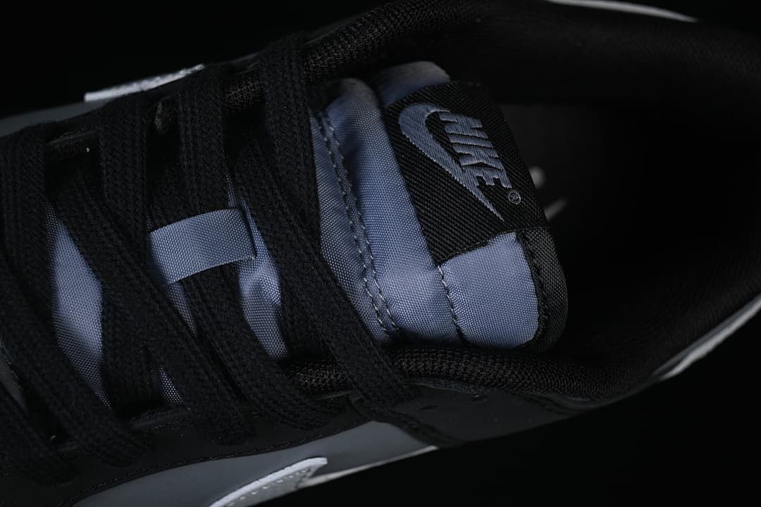 Close-up of the black laces and tongue