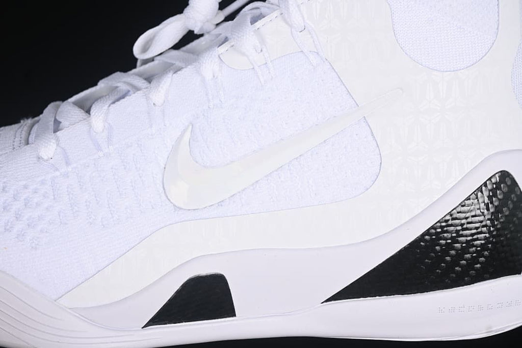 Close-up of the white side panel, Swoosh logo, and black heel accent