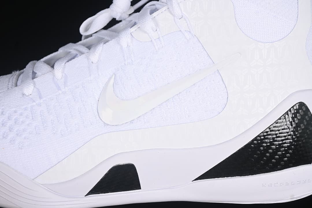 Close-up of the white side panel, Swoosh logo, and black heel accent