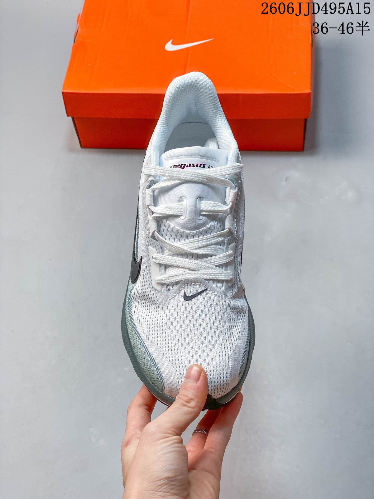 Front view of a white Nike Pegasus 42 running shoe with lace-up closure