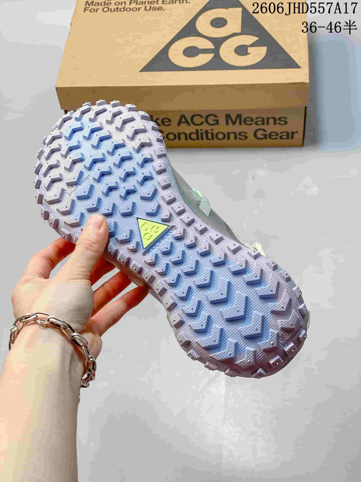 Close-up of the patterned, lugged outsole on a Nike ACG Mountain Fly sneaker.