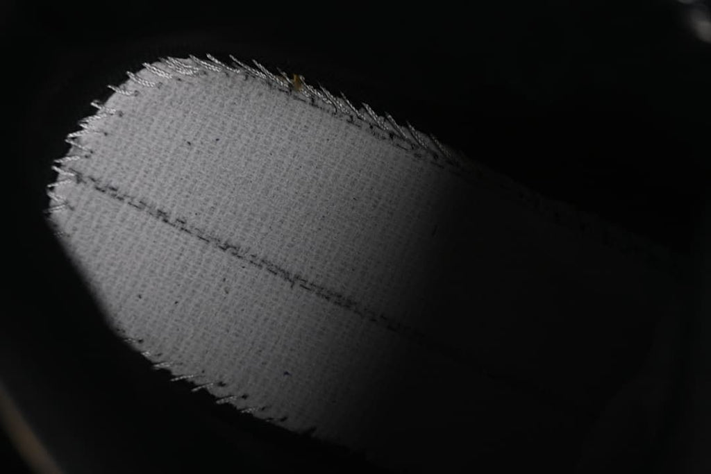 Close-up of a light-colored cut textile sample