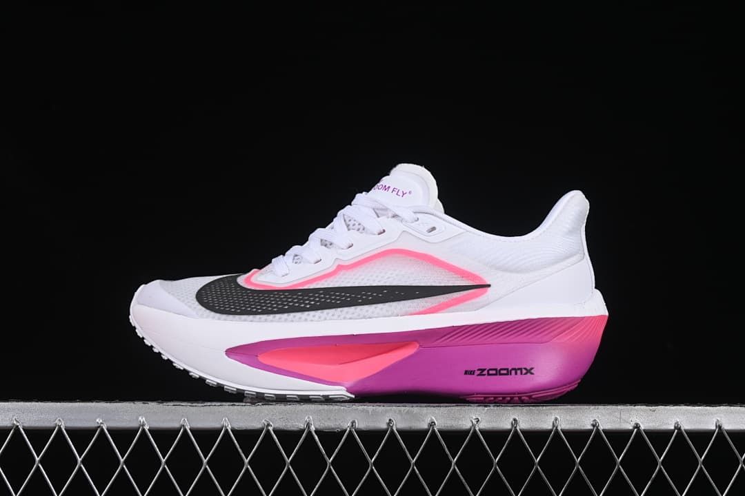 Side view of white Nike Zoom Fly 6 running shoe with black Swoosh and pink-purple sole