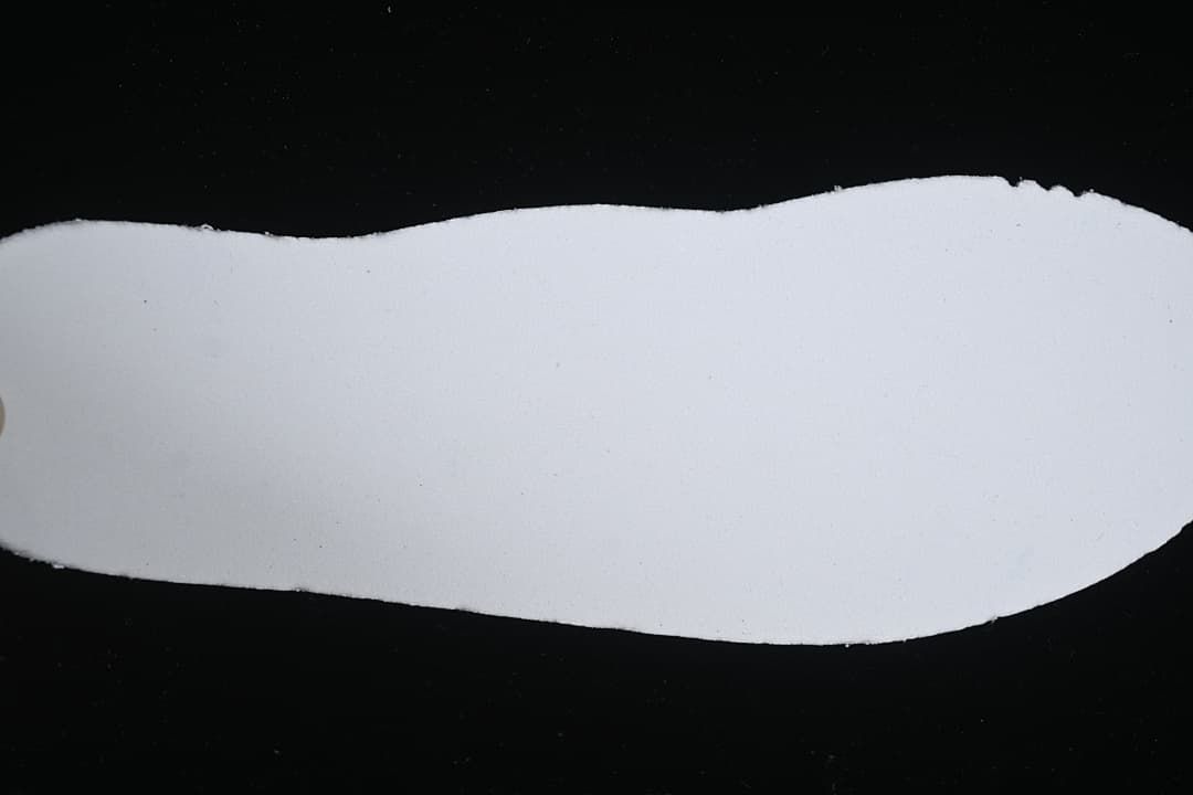 View of the sneaker's plain white footbed