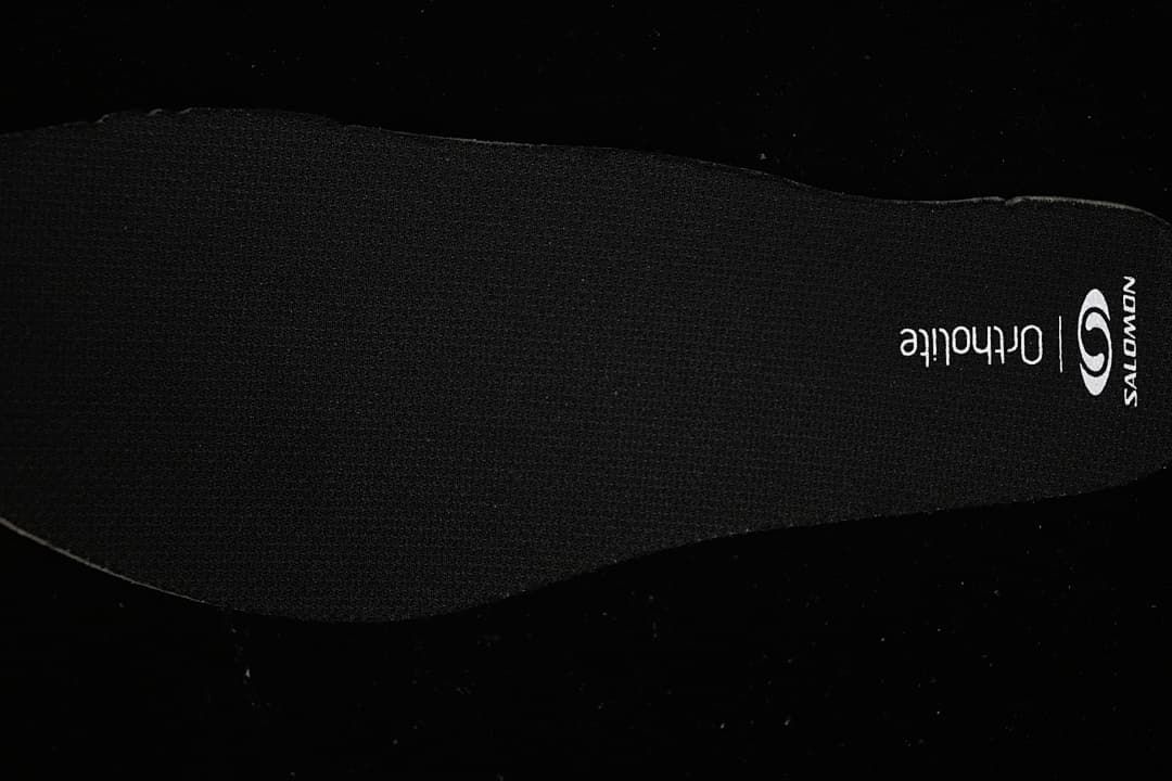 Black Salomon Ortholite insole with printed branding
