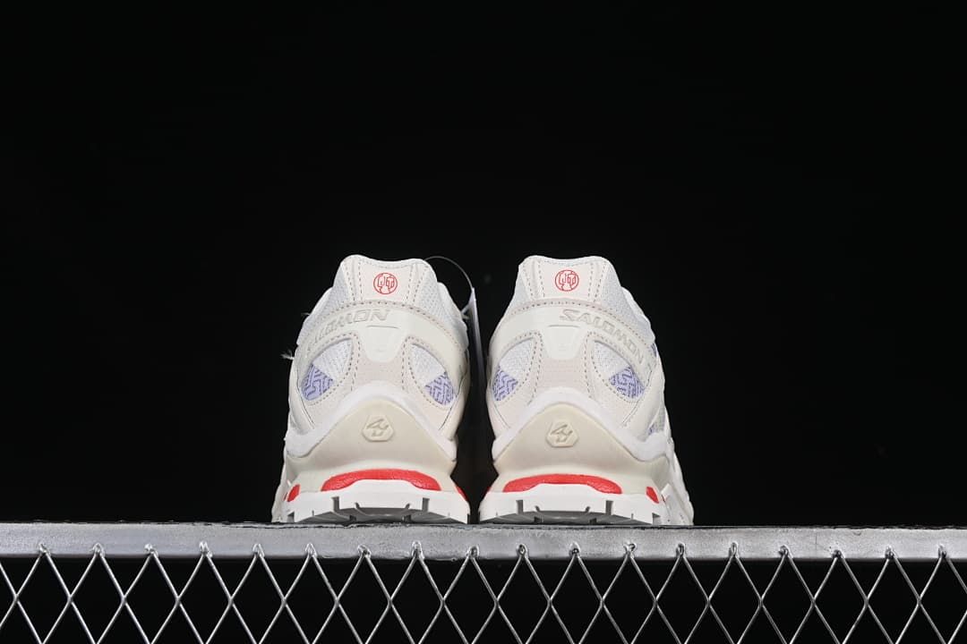 Rear view of both shoes showing the heels and outsole accents.