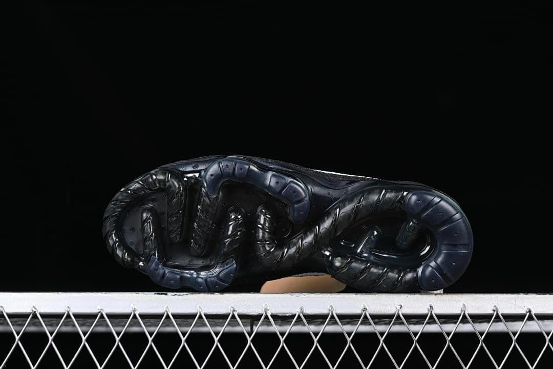 Underside view of the dark outsole.