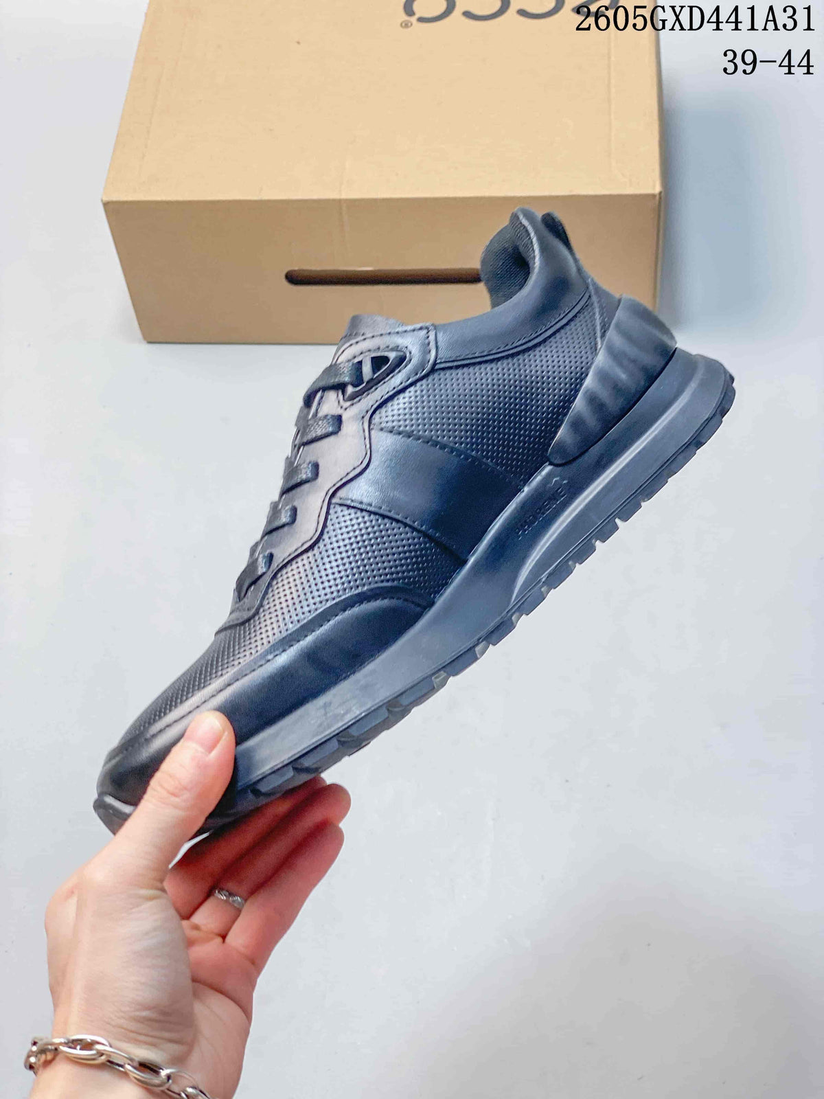 Side profile of the sneaker showing perforated panels and textured outsole