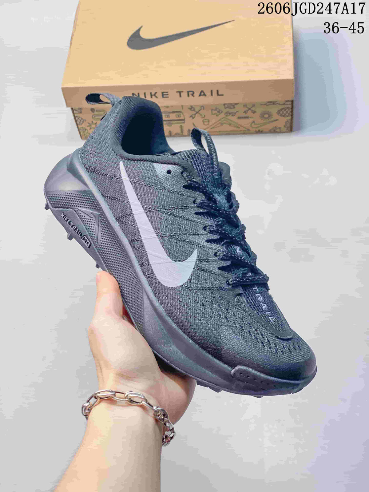 Dark gray Nike Wildhorse 10 trail running shoe with a light-colored side logo