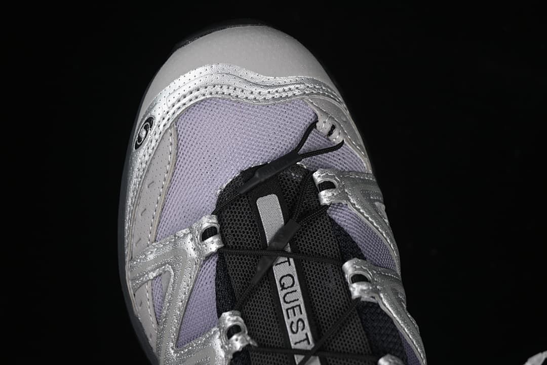 Top view of the toe, laces, and pale lavender panels