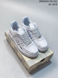 Pair of white and grey patterned Nike Air Force 1 ’07 LV8 low-top sneakers on a patterned box
