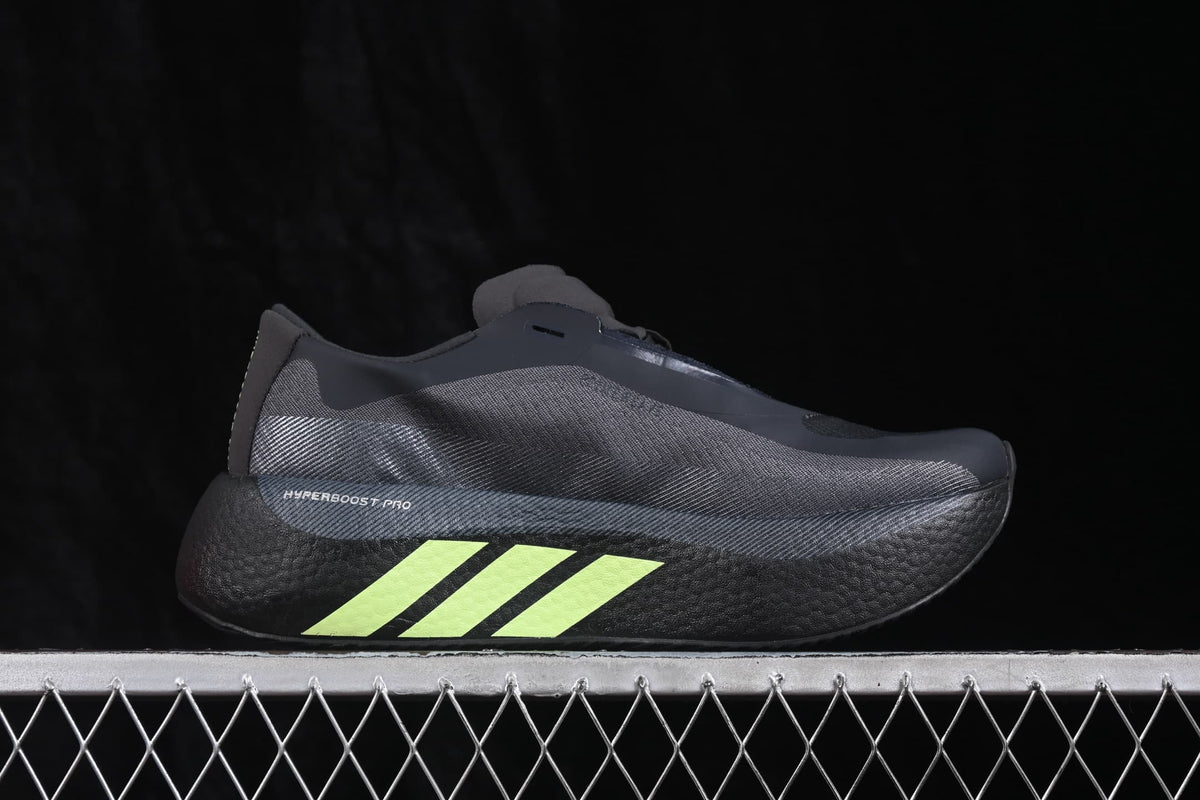Opposite side profile showing the black upper, fluorescent green stripes, and HyperBoost branding.