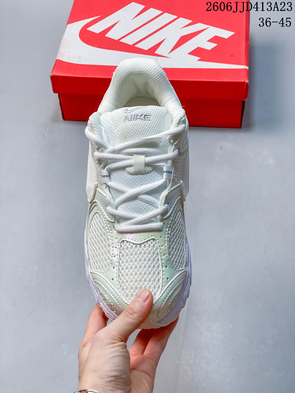 Top view highlighting the mesh tongue, laces, and paneled upper of a Nike Air Zoom Winflo 12 shoe.