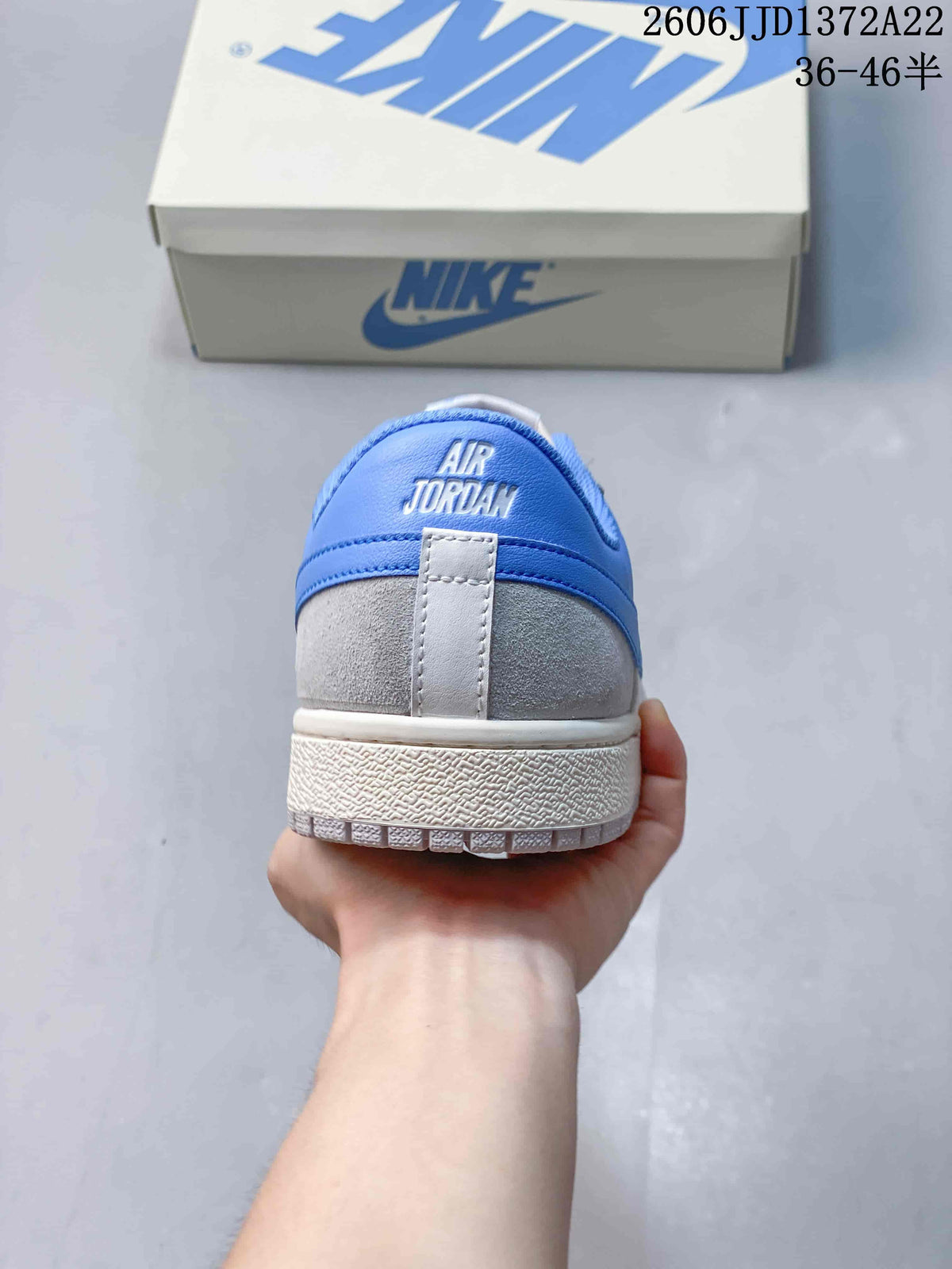 Rear view showing the blue heel panel and Air Jordan lettering