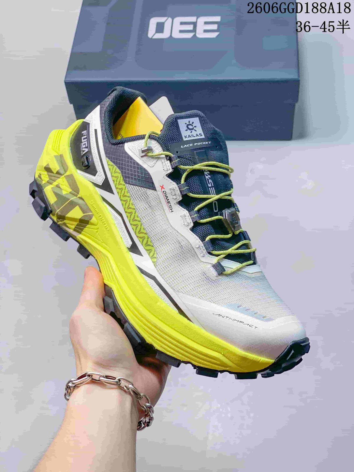 Kailas FUGA EX330 trail shoe in gray, white, and lime with quick lacing and a lugged sole