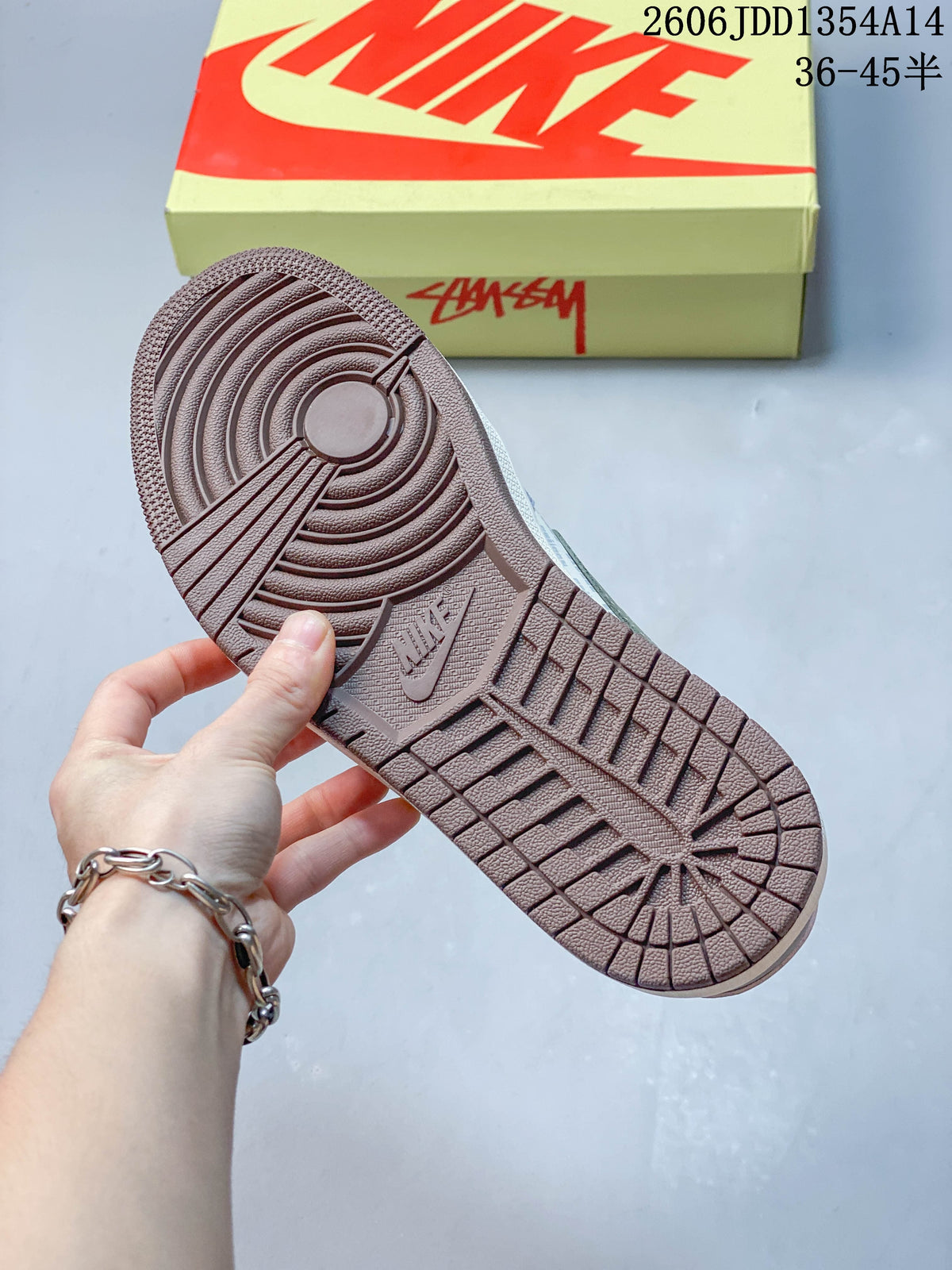 Close view of the brown outsole with circular traction pattern