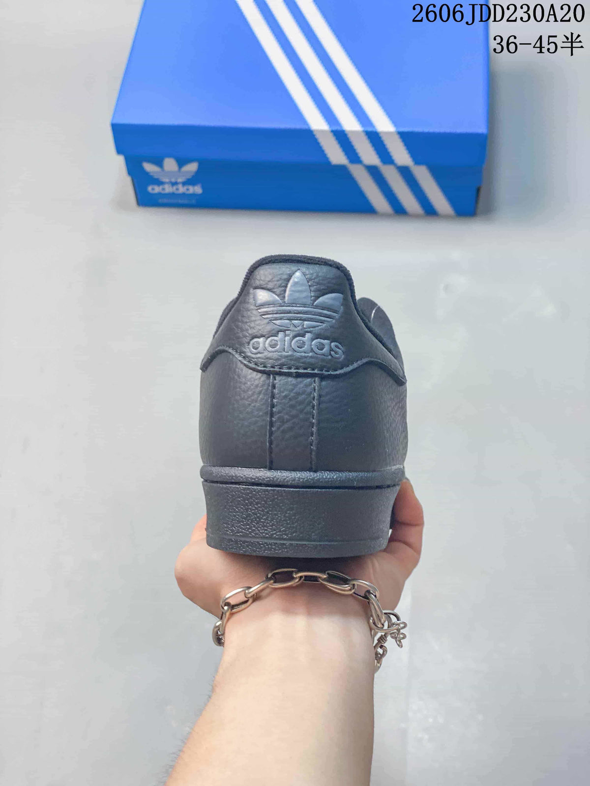 Rear view showing the heel panel and Adidas Originals trefoil branding