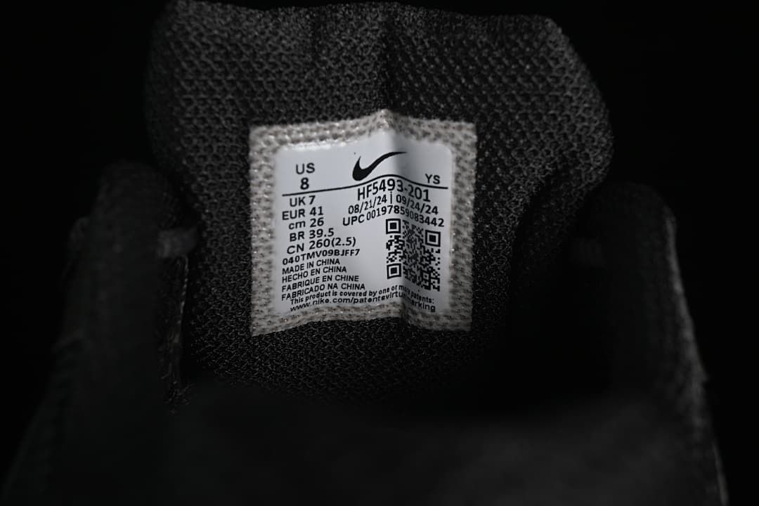 Close-up of shoe tongue label showing size and style code