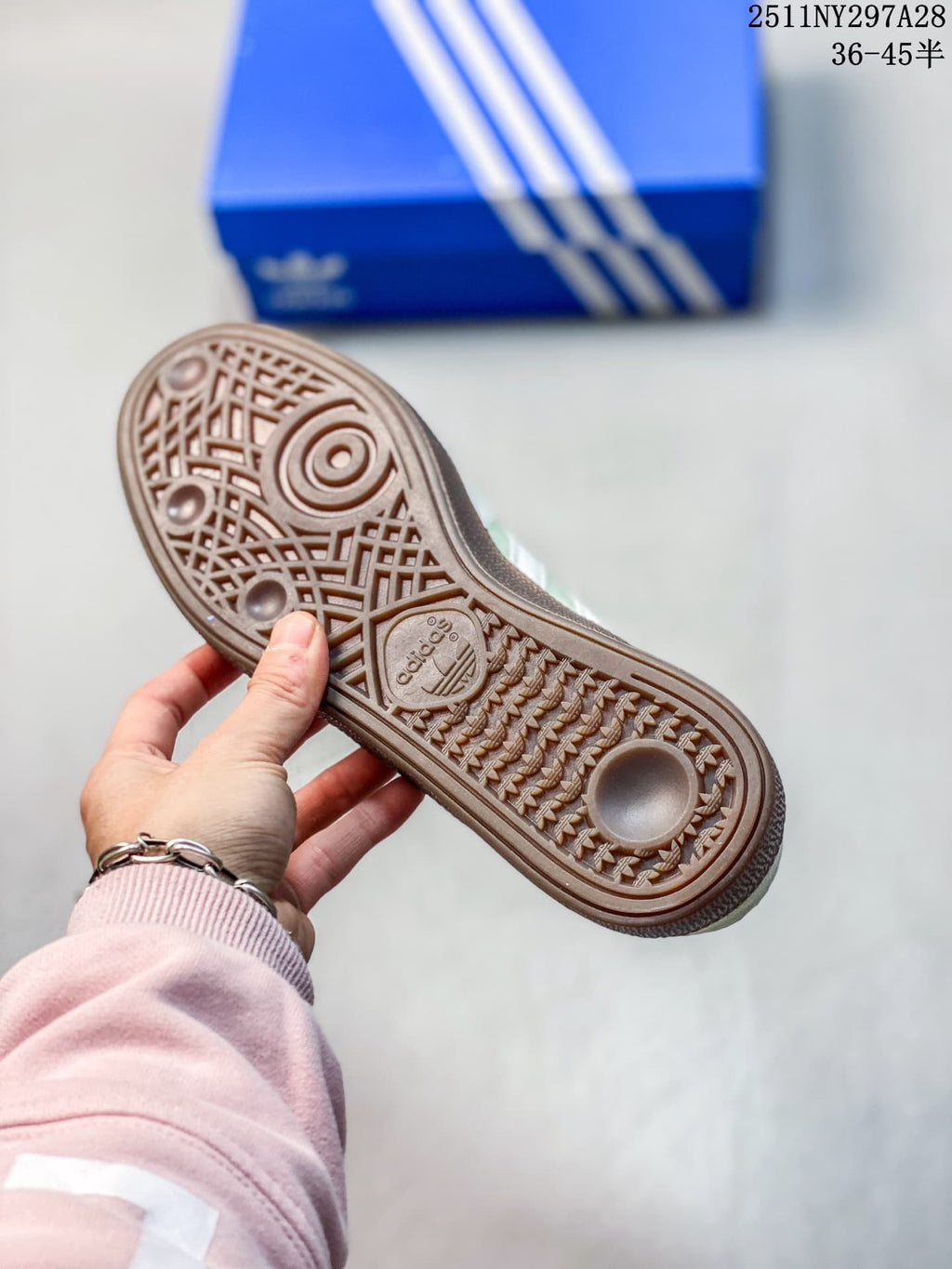 Close-up of the brown patterned outsole on an adidas Handball Spezial sneaker.