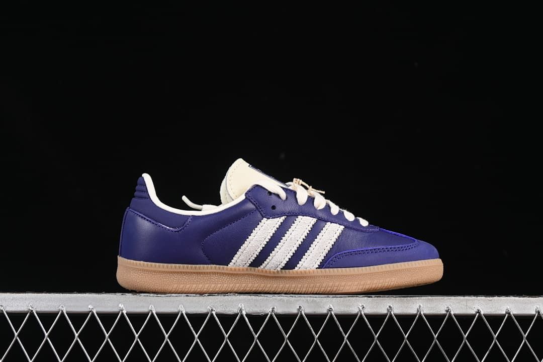 Side profile showing the white stripes and gum-colored outsole