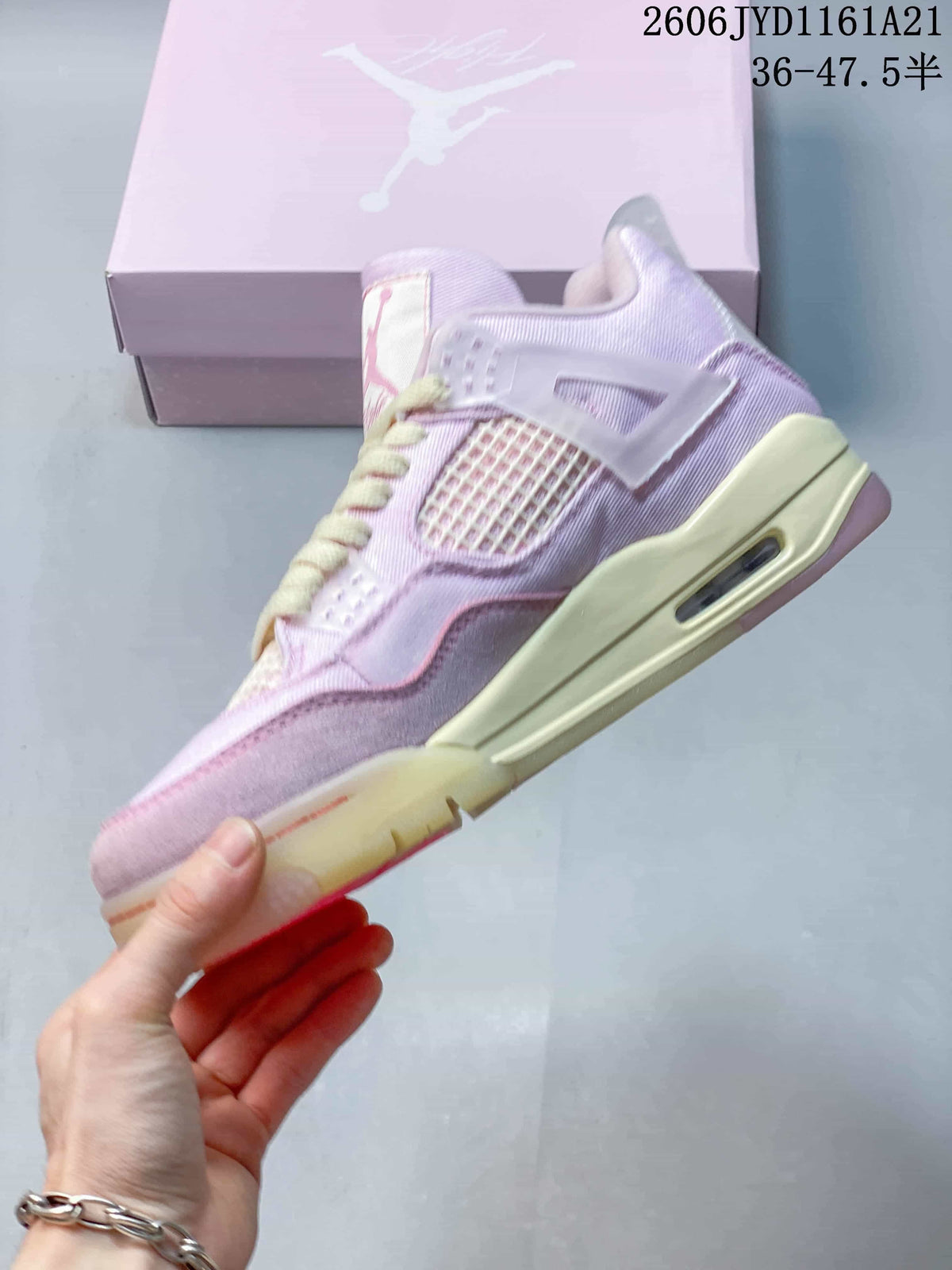 Side view of a pink Jordan high-top sneaker with mesh panels and a visible air unit.