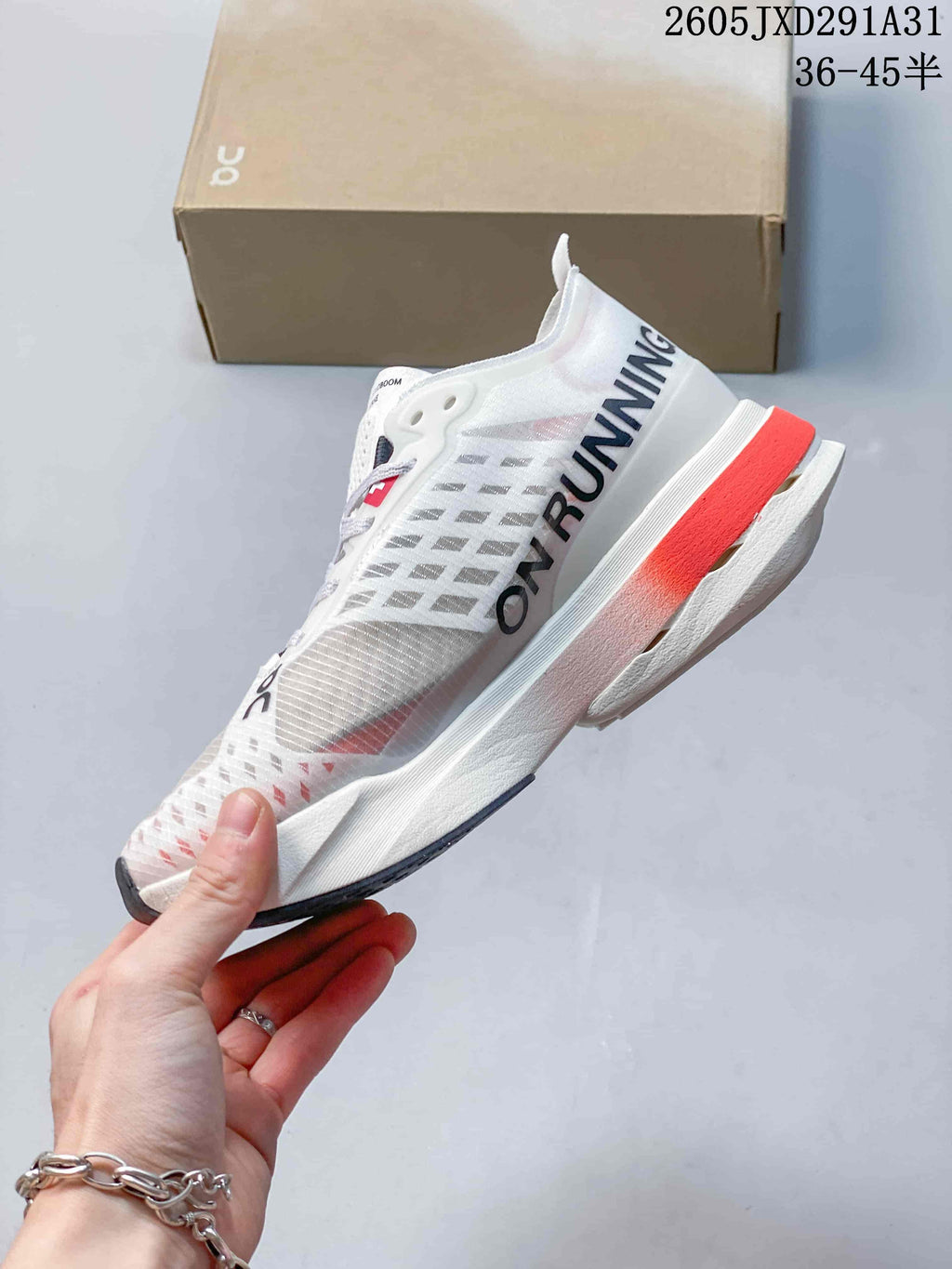 Side view showing the shoe's high-profile midsole and printed branding