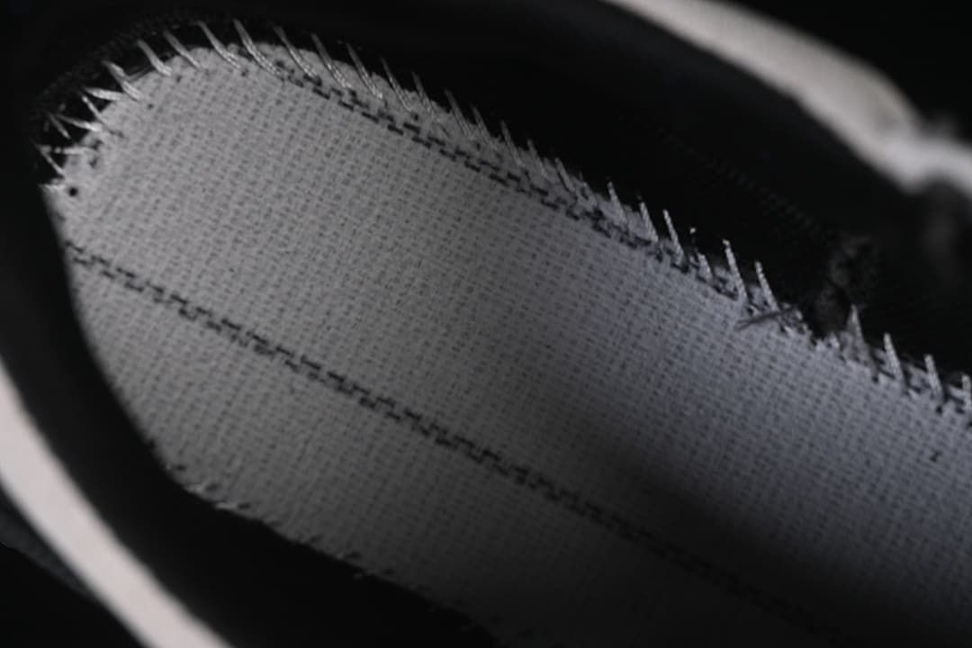 Close-up of interior shoe construction and stitching